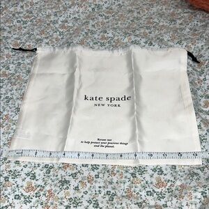 Kate Spade Cream with Black Dust Bag (approximately 13.5” x 12”)